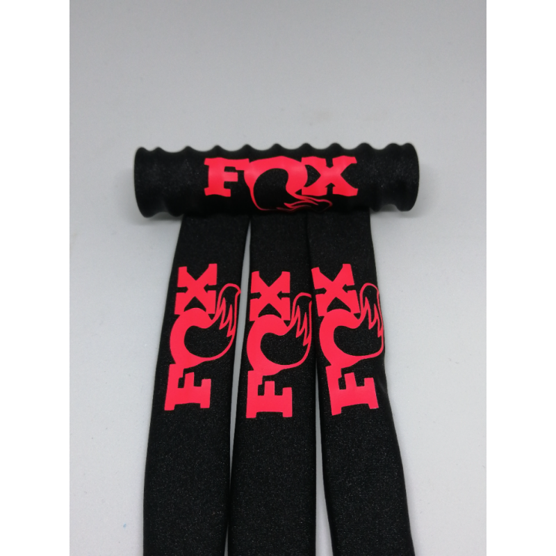 FUNDAS 1/8 PROTECCION AMORTIGUADORES RC  FOX LICRA NEGRA LOGO ROJO FLUOR rcprogranada.com - Imagen 1
