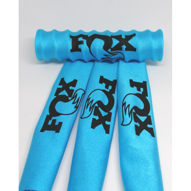 FUNDAS 1/5 PROTECCION AMORTIGUADORES RC  LICRA AZUL FLUOR DISEÑO NEGRO - Imagen 1