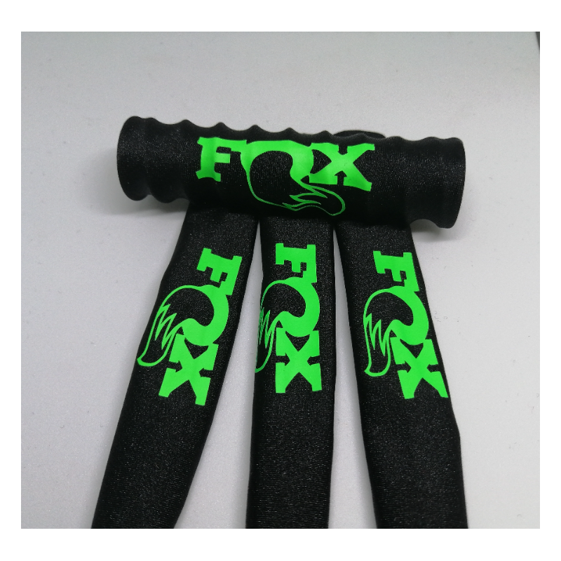 FUNDAS  DE PROTECCION PARA AMORTIGUADORES  1/5NEGRAS,LOGO VERDE FLUOR - Imagen 1